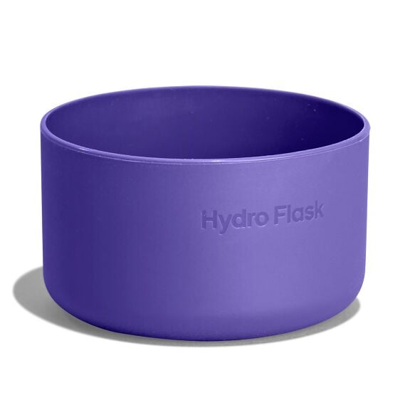 Purple Hydro Flask silicone cup or sleeve with smooth matte finish, straight sides, rounded rim, and "Hydro Flask" embossed on the exterior.
