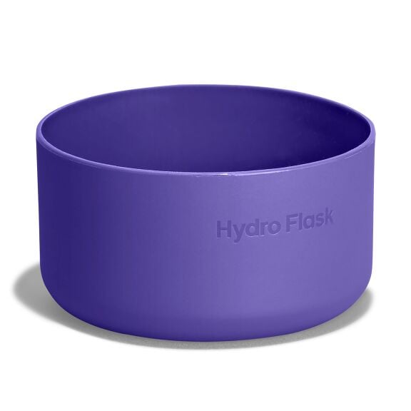 Purple Hydro Flask bowl with smooth rounded sides, matte finish, slightly thicker rim, and embossed brand name on the side.