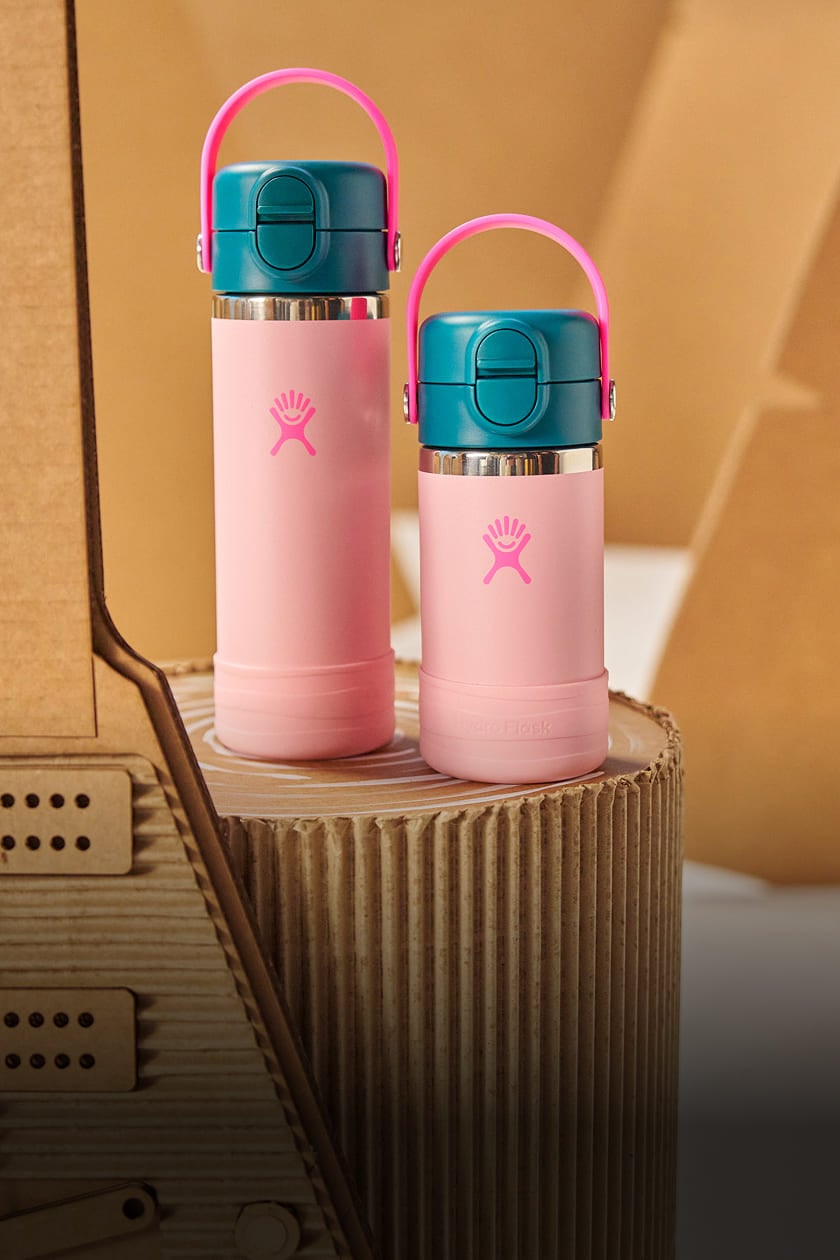 two pink kids hydro flask bottles